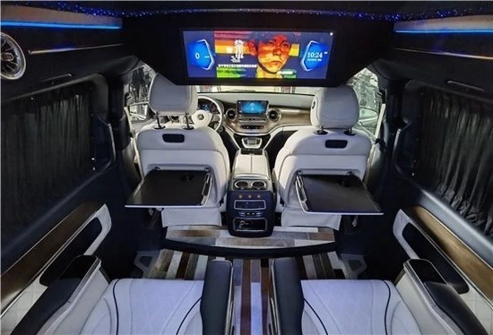 Mercedes-Benz V250 with ceiling TV and seat back table